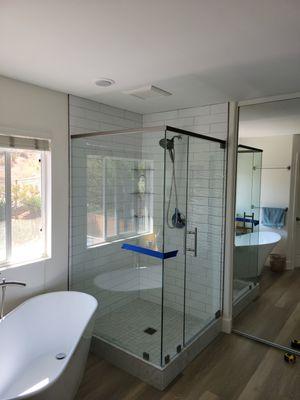 3 panel frameless shower door with header