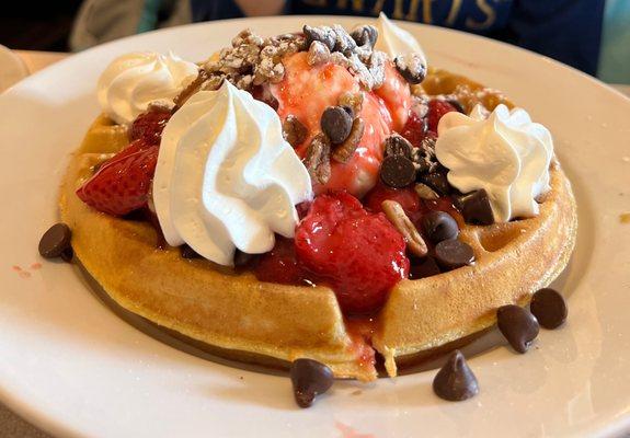 Kids will love this: Waffle (Very tasty on its own) with vanilla ice cream, strawberries, chocolate chips,whip cream, side of sausage too