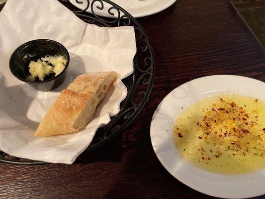 Bread with butter and garlic dipping sauce