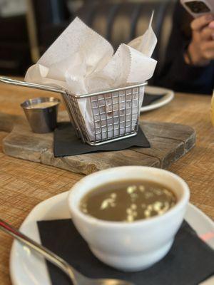 Soup plus curds in the background