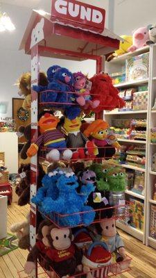 We carry a variety of GUND plush toys, including Sesame Street and Curious George.