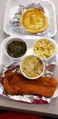 Fried fish, mixed greens, mac and cheese, potatoes and onions, and corn bread