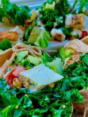 Caesar salad with tofu, avocado & wheat wrap