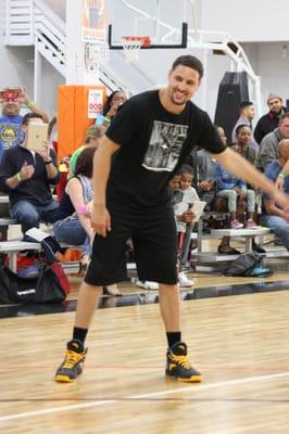 Klay Thompson shooting hoops with the kids at Jamtown