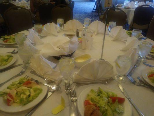 The salad and water at the very begining. There is assigned seating