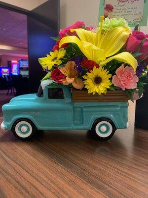 This will make your vintage car/truck enthusiasts smile! Great floral arrangement,  flowers were fresh and lasted a long time