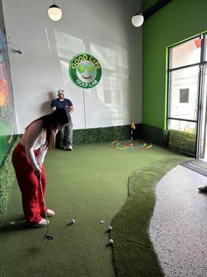 Practice putts up to 20' long with our PGA style indoor putting green.