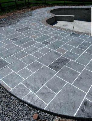 Stamped concrete pool deck and patio