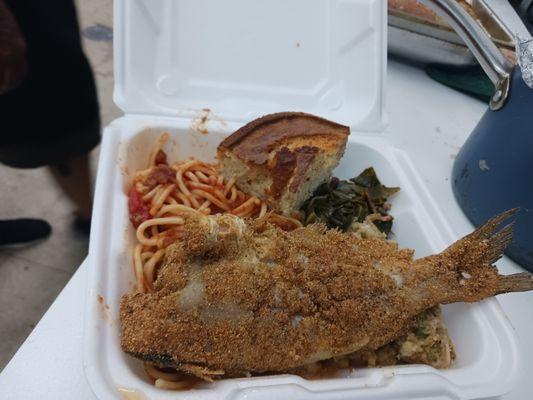 Whole catfish, greens, spaghetti, and cornbread