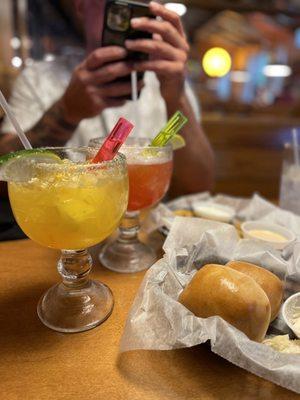 Mango margarita & strawberry margarita. Side of their bread rolls with their cinnamon honey butter