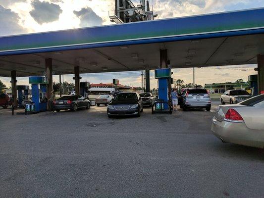 Outside. Gas pumps. There are 16 pumps at this station.