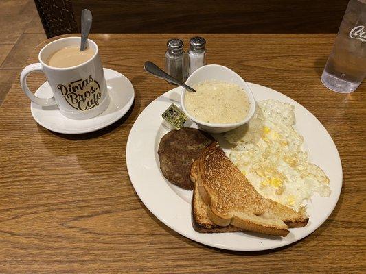 Two egg  breakfast sausage grits sourdough toast