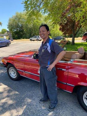 Oscar himself proudly standing next to one of his favorite vehicles to work on. The Mercedes SL R107 Chassis.