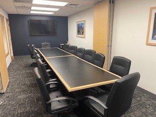 OUr newly renovated large conference room holds 16 people with a 70" flatscreen with Apple TV and HDMI.  Wifi included.