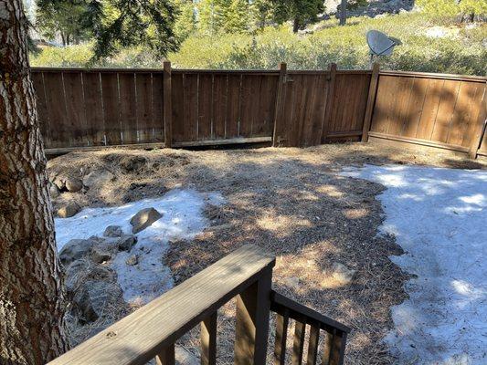 Back patio - before (nothing special, unusable space, just a pile of dirt, hill)