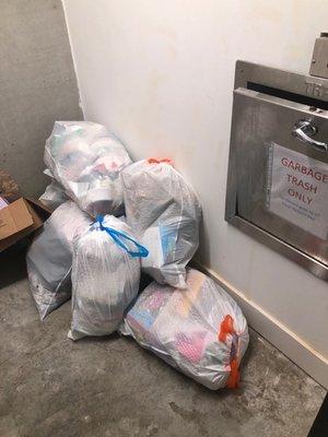 Trash constantly backed up from compactor