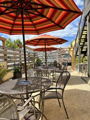 A peaceful, covered outdoor patio. Hidden oasis in Downtown Springfield.