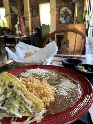 Crispy chicken taco, chili rellano with beans and rice. Yum!