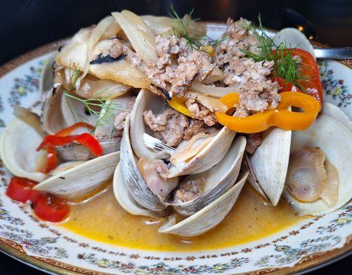 Clams and sausage with peppers and onions