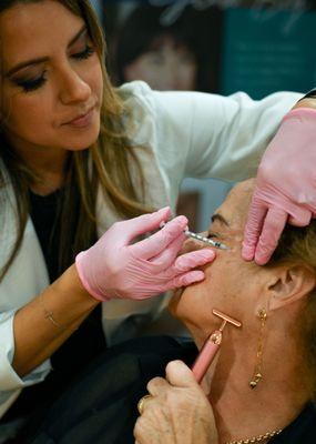 Our provider and Master Injector, Dominique Farinas, APRN, injecting Botox.