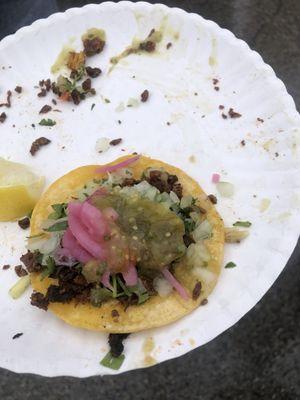 Not the best photo; asada w/ pickled onion, onion and cilantro, salsa, and a lemon.