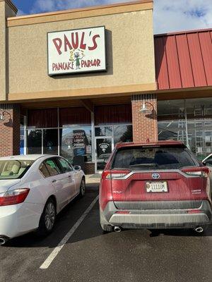 nondescript strip mall store front next to bookstore