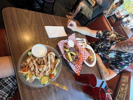 Cobb salad, the BEST garlic parmesan chicken wings, and a baked potato with really good chili and cheese.