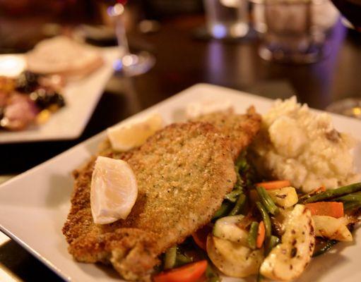 Pork cutlet- garlic mashed potatoes- sautéed fresh vegetables