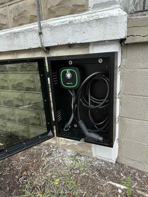 Wallbox EV charger mounted with protective box.