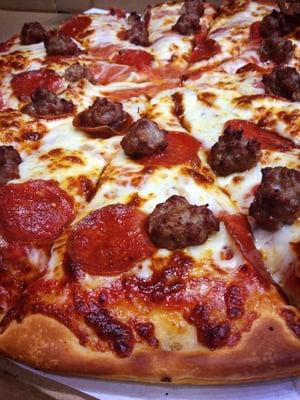 Rocco's Pizza - dough made daily, homemade sauce, freshly shredded provolone cheese, pepperoni & fresh sausage