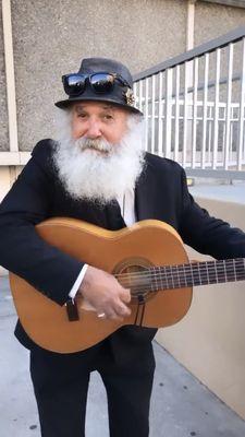 Rad Man bumping the jams outside of the court