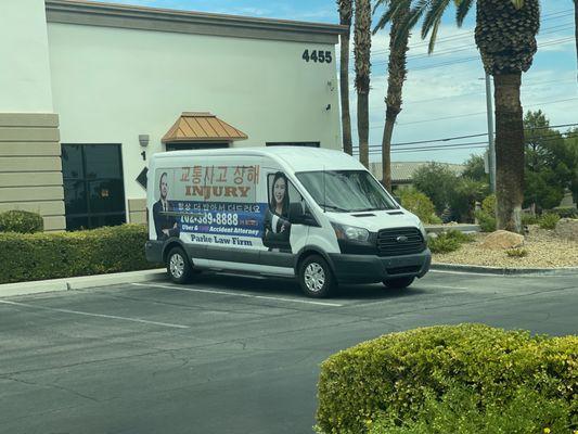 Why is this van sitting in front of a vacant office?