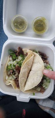 Carne asada (beef/steak) street tacos.