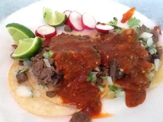 They had .50 Thursday tacos specials but I got the regular carnes asada & lengua tacos for $1.39 each.  The red sauce was good.