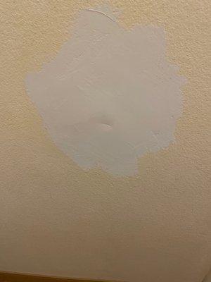 Drywall patch. It's the size of a dinner plate.