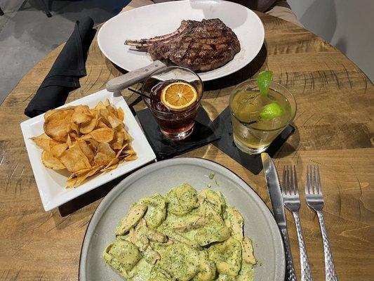 Pesto Tortellini with chicken, side of homemade chips and a ribeye steak