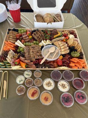 Large Gone Grazy board with extra box of bread and assortment of dips and jams