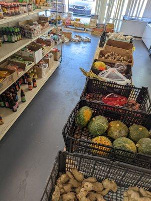 Ginger, Gourds, Garlic...you know, all the G's waiting to be stocked. The owner was busy just setting up the new spot.