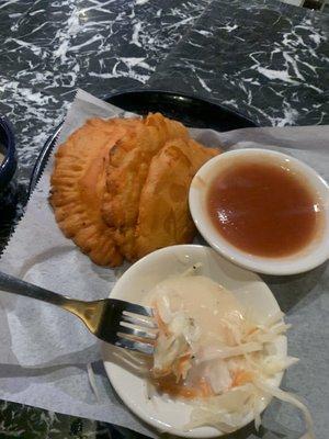 Empanadas Beef, Chicken & Potato.  Pickled Cabbage  Tomato Based Sauce