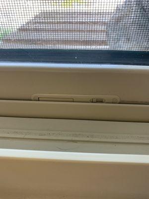 Window is too low and the security latch does not properly function.