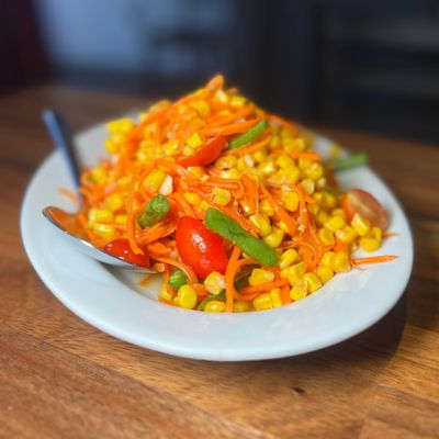 Khao Phot: Sweet corn and julienned carrot salad