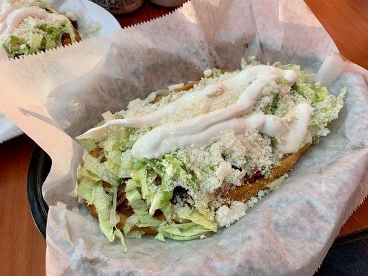 The was a suadero (brisket) Huaraches, which is soooo much bigger than I expected. It's at least twice the size of a sopes.