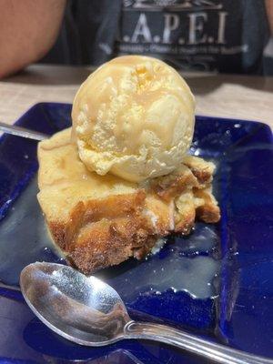 White chocolate bread pudding with whiskey sauce and vanilla ice cream!! YUM