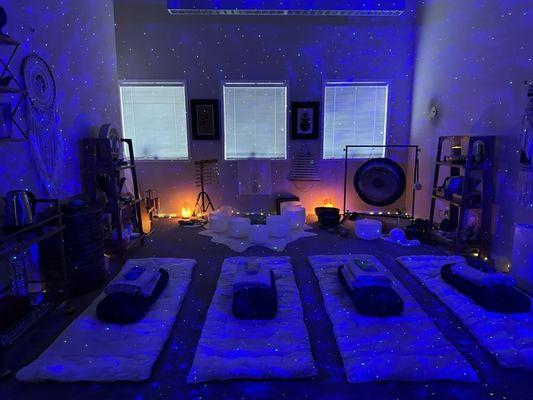 The darkened room with starry sky add to a calm and relaxing mood.