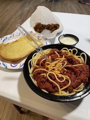 Spaghetti and meat sauce. Side of breaded mushrooms.