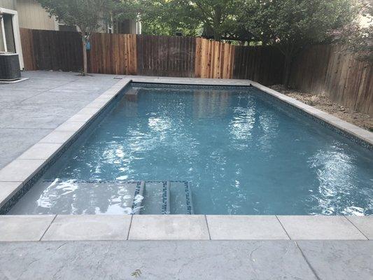 Our beautiful new pool! Landscaping around the back has not been completed