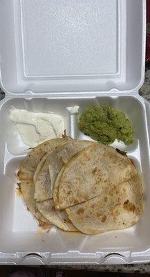 Chicken quesadilla with guacamole and sour cream