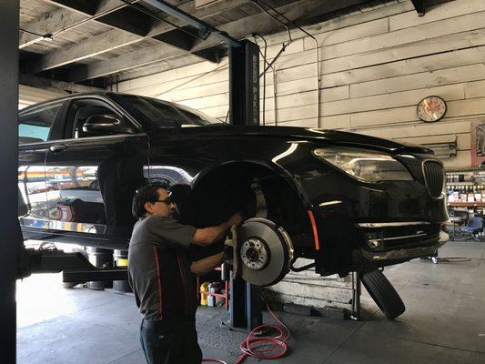 Front and rear brake service. 2015 BMW 740li.