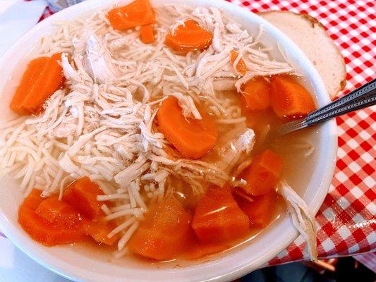 Bowl of chicken noodle soup comes with bagel crisp