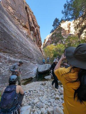 Rock climbing area. Tiny pond/trickle of water area.